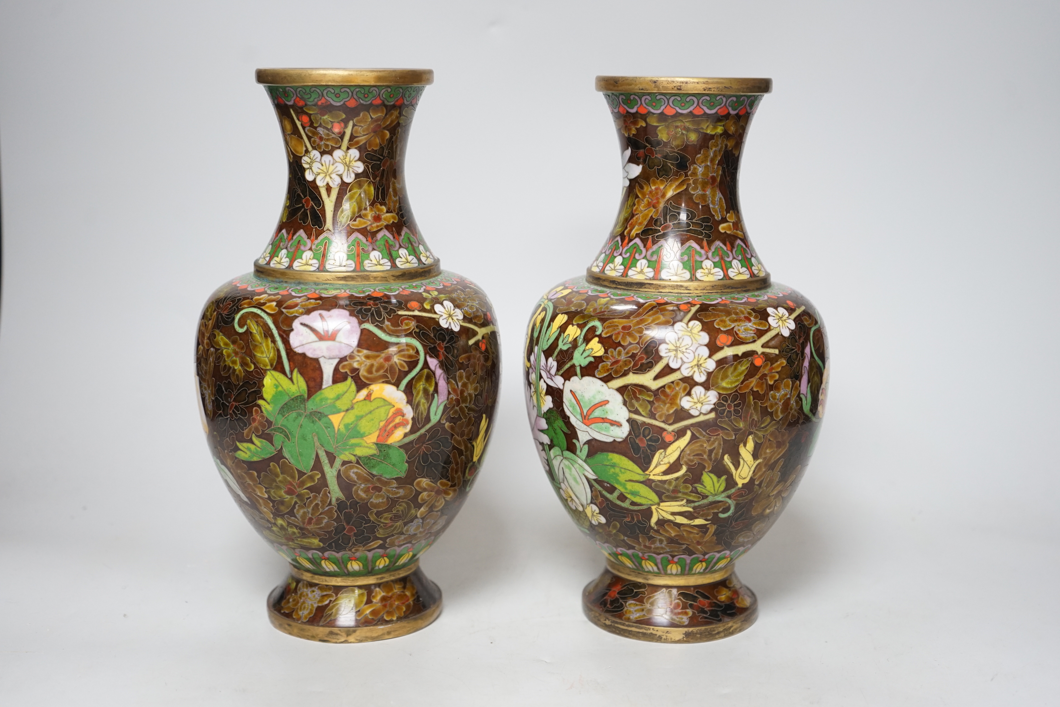 A pair of Chinese cloisonné enamel vases, 26cm